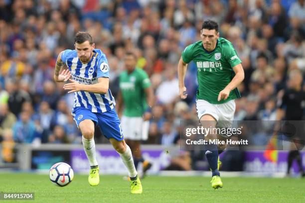 Pascal Gross of Brighton gets away from Gareth Batty of WBA to score his second goal during the Premier League match between Brighton and Hove Albion...