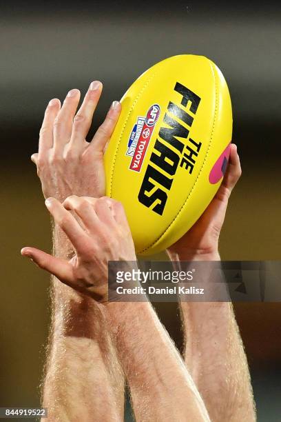 Players compete for the Sherrin football during the AFL First Elimination Final match between Port Adelaide Power and West Coast Eagles at Adelaide...