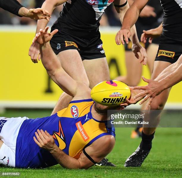 Players compete for the Sherrin football during the AFL First Elimination Final match between Port Adelaide Power and West Coast Eagles at Adelaide...