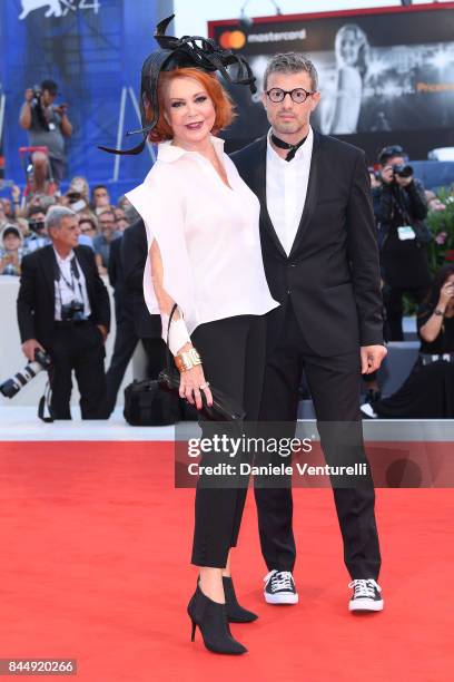 Marina Ripa di Meana and guest arrive at the Award Ceremony of the 74th Venice Film Festival at Sala Grande on September 9, 2017 in Venice, Italy.