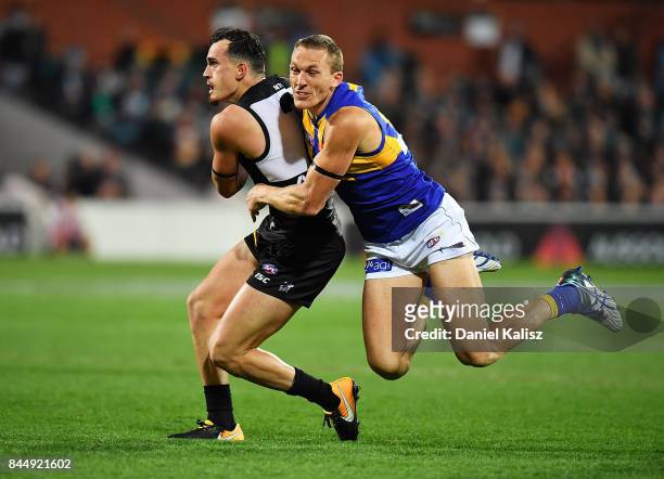 Drew Petrie of the Eagles tackles Sam Powell-Pepper of the Power during the AFL First Elimination Final match between Port Adelaide Power and West...