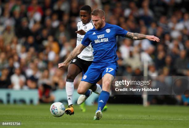 Aron Gunnarsson of Cardiff City and Ryan Sessegnon of Fulham in action during the Sky Bet Championship match between Fulham and Cardiff City at...