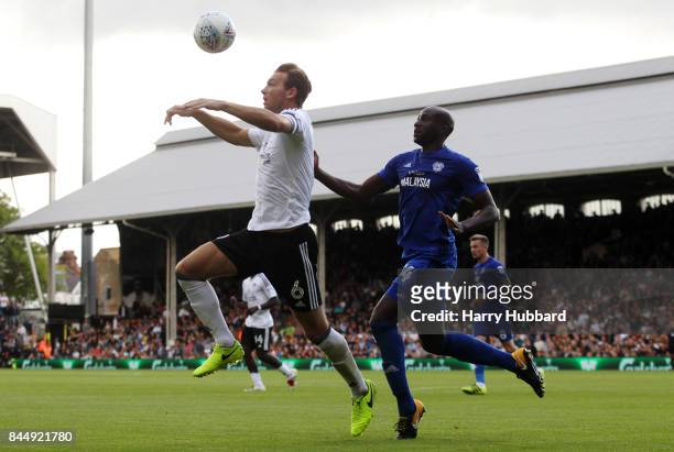 Sol Bamba of Cardiff City and Kevin McDonald of Fulham in action during the Sky Bet Championship match between Fulham and Cardiff City at Craven...