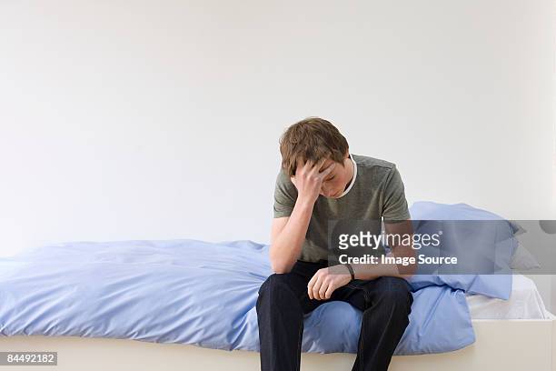 a teenage boy crying - one teenage boy only stock pictures, royalty-free photos & images