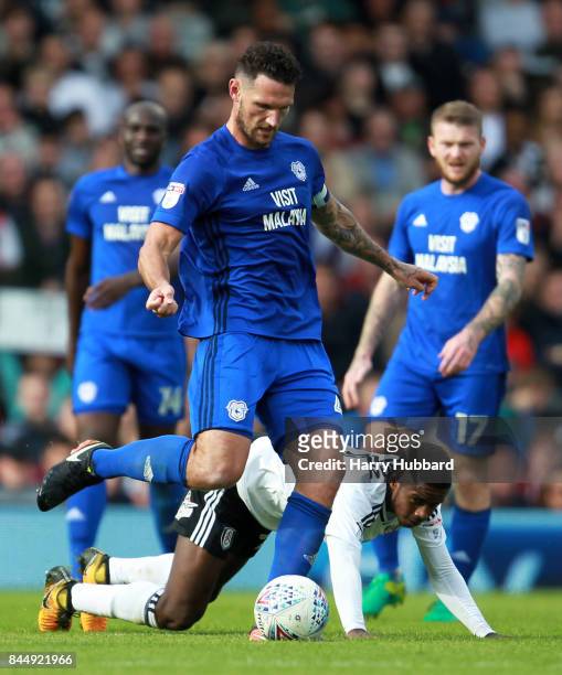Sean Morrison of Cardiff City and Ryan Sessegnon of Fulham in action during the Sky Bet Championship match between Fulham and Cardiff City at Craven...