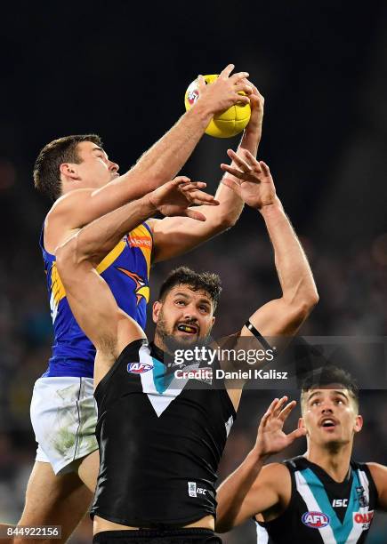 Jamie Cripps of the Eagles marks the ball over Patrick Ryder of the Power during the AFL First Elimination Final match between Port Adelaide Power...