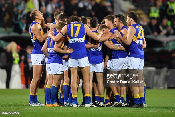 The Eagles players form a huddle during the AFL First Elimination Final match between Port Adelaide Power and West Coast Eagles at Adelaide Oval on...