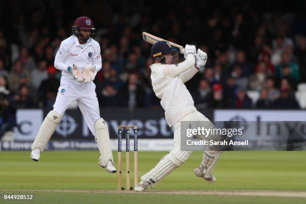 Tom Westley of England hits out as West Indies wicket keeper looks on during day three of the 3rd Investec Test match between England and West Indies...