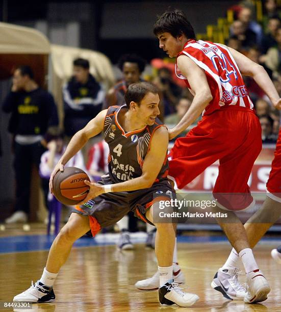 Albert Oliver of Pamesa Valencia competes with Nemanja Bjelica of Red Star in action during the Eurocup Basketball Last 16 Game 1 match between Red...