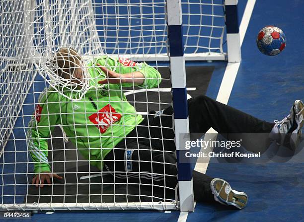 Johannes Bitter of Germany sits on the pitch after getting a goal during the Men's World Handball Championships main round match group two between...