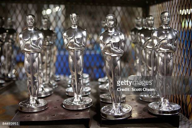 Oscar statuettes sit in a cabinet waiting to be polished at R.S. Owens & Company January 27, 2009 in Chicago, Illinois. R.S. Owens manufactures the...