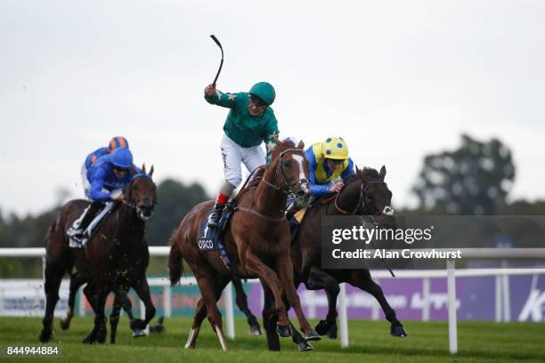 Andrea Atzeni riding Decorated Knight celebrate winning The Qipco Irish Champion Stakes at Leopardstown racecourse on September 9, 2017 in Dublin,...
