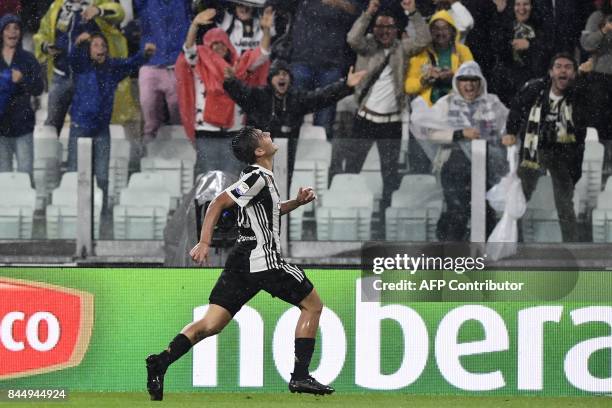 Juventus' Argentinian forward Paulo Dybala celebrates after scoring during the Italian Serie A football match Juventus vs Chievo at the Allianz...