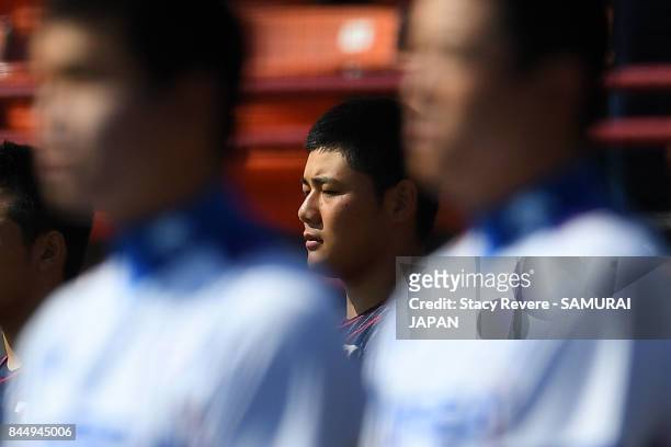 Kotaro Kiyomiya of Japan stands for the Japanese National Anthem prior to a game against Korea during the WBSC U-18 Baseball World Cup Super Round...