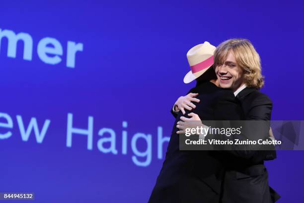 Charlie Plummer receives the 'Marcello Mastroianni' Award for Best New Young Actor or Actress for 'Lean On Pete' from 'Venezia 74' jury member Yonfan...