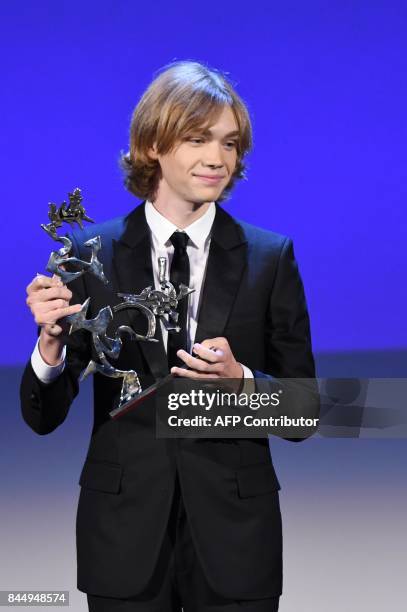 Actor Charlie Plummer receives the Marcello Mastroianni Award for Best New Young Actor for his character in the movie "Lean on Pete" during the award...