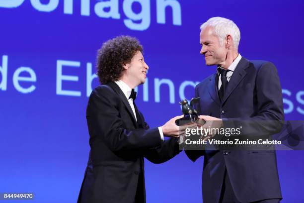 Martin McDonagh receives the Best Screenplay Award for 'Three Billboards Outside Ebbing, Missouri' from 'Venezia 74' jury member Michel Franco during...
