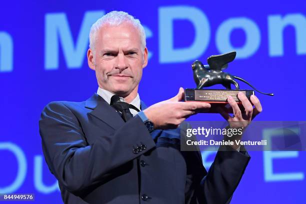 Martin McDonagh receives the Best Screenplay Award for 'Three Billboards Outside Ebbing, Missouri' during the Award Ceremony of the 74th Venice Film...