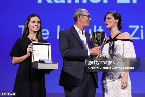 Kamel El Basha receives the Coppa Volpi for Best Actor Award for The Insult from 'Venezia 74' jury member Anna Mouglalis with Jaeger-LeCoultre Unique...