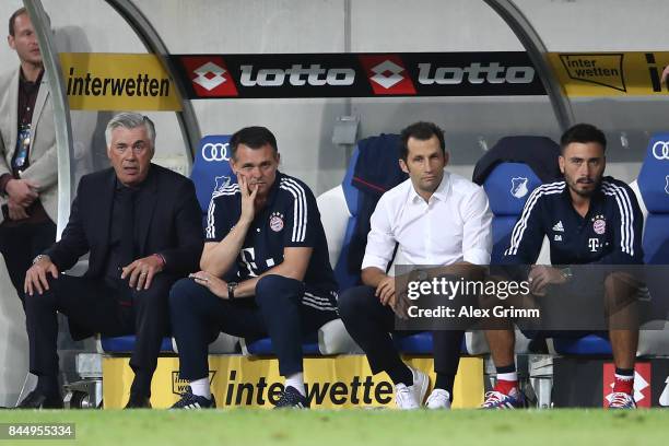 Coach Carlo Ancelotti of Bayern Muenchen , Willy Sagnol , sporting director Hasan Salihamidzic of Bayern Muenchen and Davide Ancelotti during the...