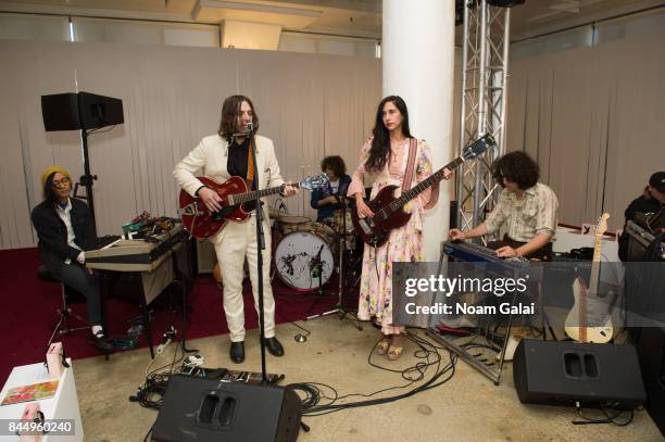 Elizabeth Hart and Tres Warren of Psychic Ills perform at the Jill Stuart fashion show during New York Fashion Week on September 9, 2017 in New York...