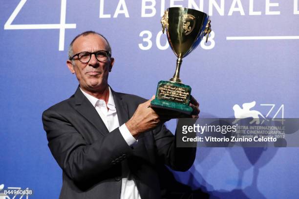 Kamel El Basha poses with the Coppa Volpi for Best Actor Award for The Insult at the Award Winners photocall during the 74th Venice Film Festival at...