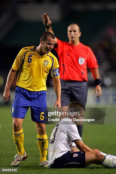 Daniel Andersson of Sweden talks down to Robbie Rogers of the USA after a stoppage in play during their international friendly match at The Home...