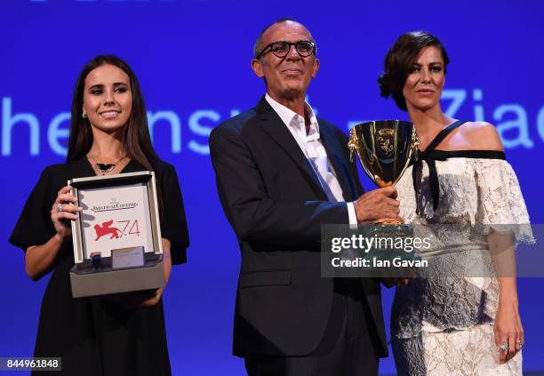 Kamel El Basha receives the Coppa Volpi for Best Actor Award for The Insult from 'Venezia 74' jury member Anna Mouglalis with a Jaeger-LeCoultre...