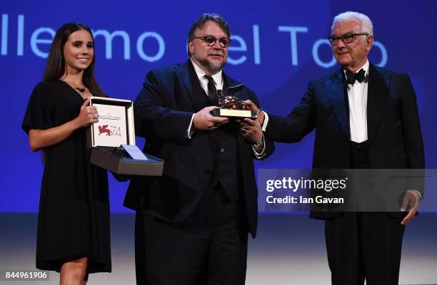 Director Guillermo del Toro receives the Golden Lion for Best Film Award for 'The Shape Of Water' from President of the festival Paolo Baratta and a...