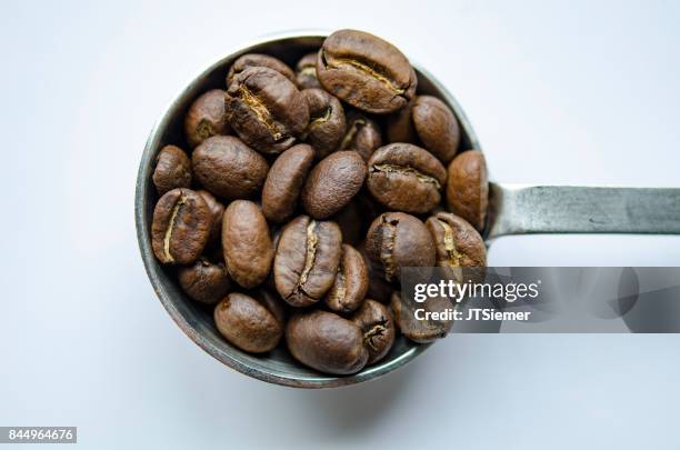 coffee bean measure - seattle coffee stock pictures, royalty-free photos & images