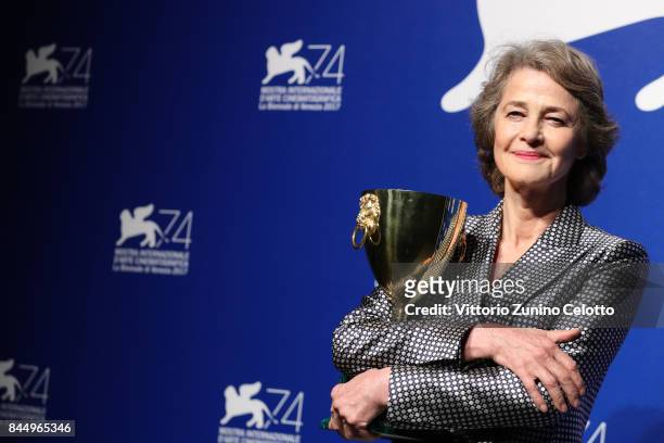 Charlotte Rampling poses with the Coppa Volpi for Best Actress Award for 'Hannah') at the Award Winners photocall during the 74th Venice Film...