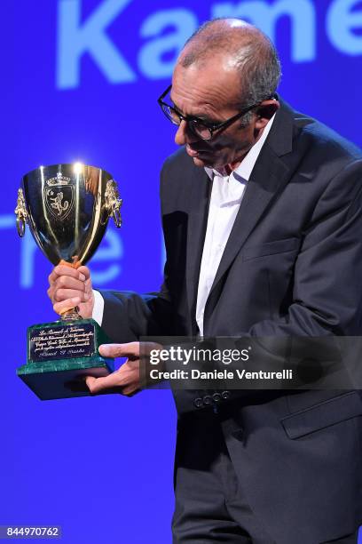 Kamel El Basha receives the Coppa Volpi for Best Actor Award for The Insult during the Award Ceremony of the 74th Venice Film Festival at Sala Grande...