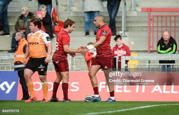 Limerick , Ireland - 9 September 2017; Simon Zebo, right, of Munster celebrates with team-mate James Hart after scoring a try during the Guinness...