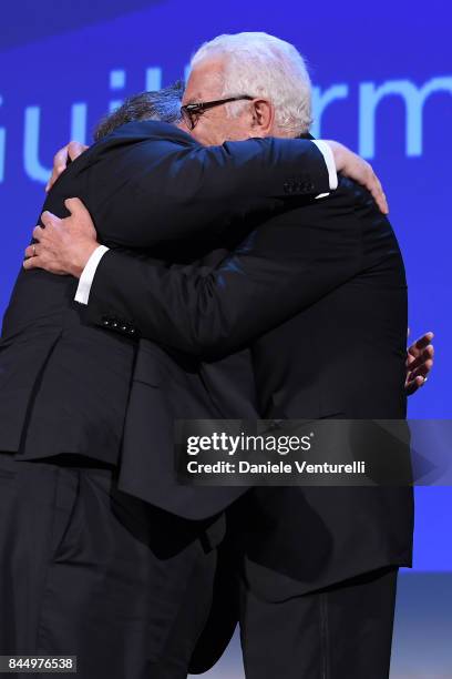 Guillermo del Toro receives the Golden Lion for Best Film Award for 'The Shape Of Water' from President of the festival Paolo Baratta during the...