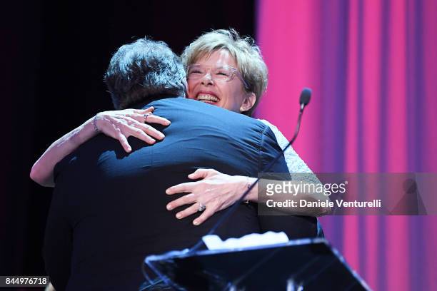 Director Guillermo del Toro is welcomed on stage by actress and president of the jury Annette Bening as he receives the Golden Lion for Best Film...