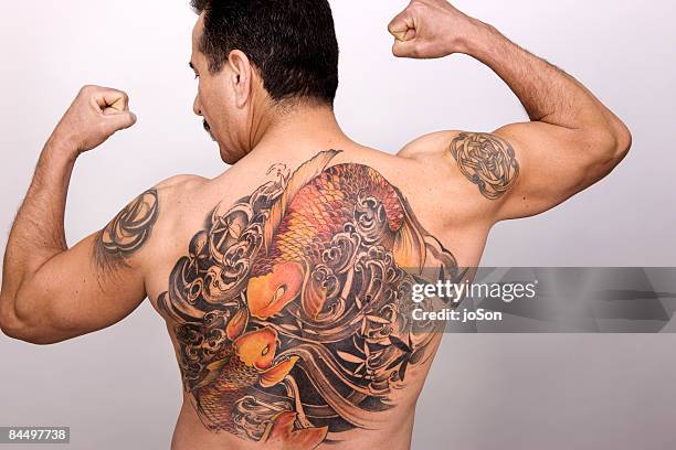 472 Back Arm Tattoos Photos and Premium High Res Pictures - Getty Images 472 Back Arm Tattoos Photos and Premium High Res Pictures - Getty Images