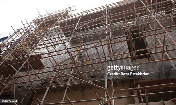 scaffolding on construction site - 足場 ストックフォトと画像