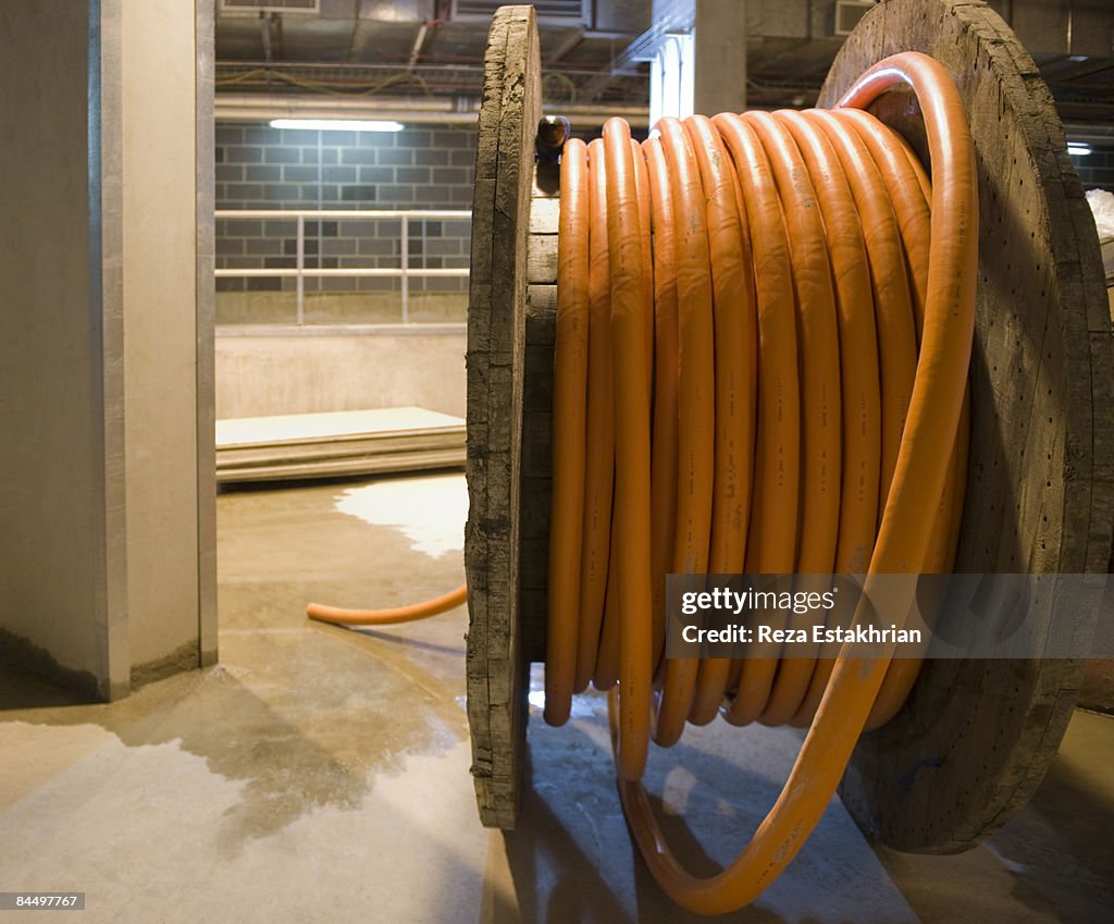 Cable for electric power supply on wooden spool.