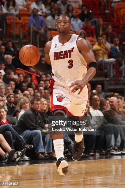 Dwyane Wade of the Miami Heat brings the ball upcourt against the Golden State Warriors during the game on December 23, 2008 at American Airlines...