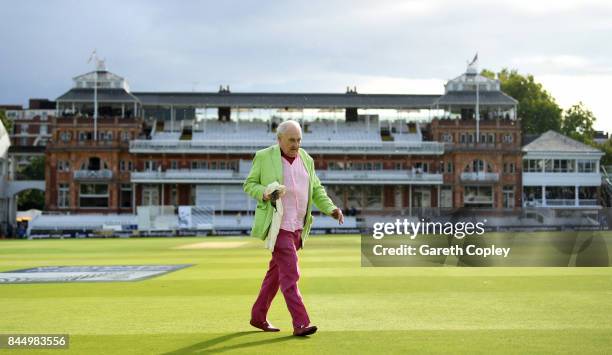 Test Match Special commentator Henry Blofeld walks across the outfield for a final time after day three of the 3rd Investec Test match between...