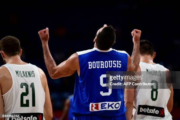 Greece's center Ioannis Bourousis celebrates after winning against Lithuania during FIBA Eurobasket 2017 men`s round 16 basketball match between...