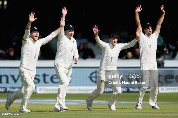 Ben Stokes, Tom Westley, Joe Root and Alastair Cook celebrate during England v West Indies - 3rd Investec Test: Day Three at Lord's Cricket Ground on...