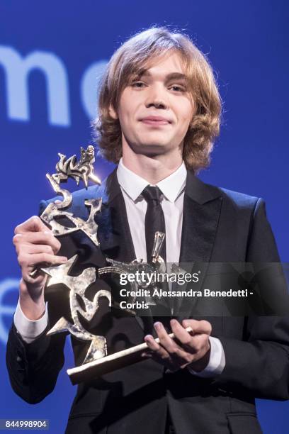 Charlie Plummer receives the Golden Lion Award for Best film for The Shape of Water, during the Award Ceremony of the 74th Venice Film Festival at...