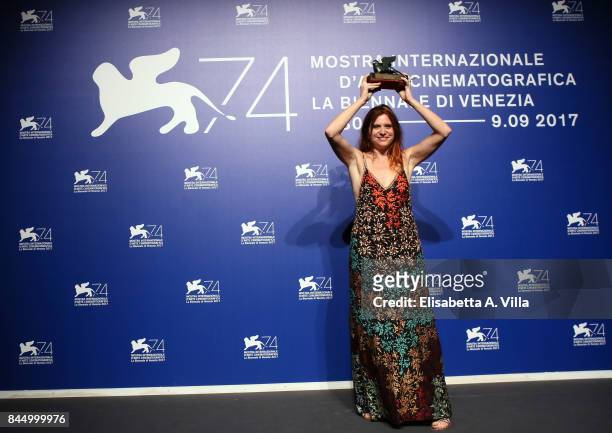 Susanna Nicciarelli poses with theOrizzonti Award for Best Film for 'Nico, 1988' at the Award Winners photocall during the 74th Venice Film Festival...