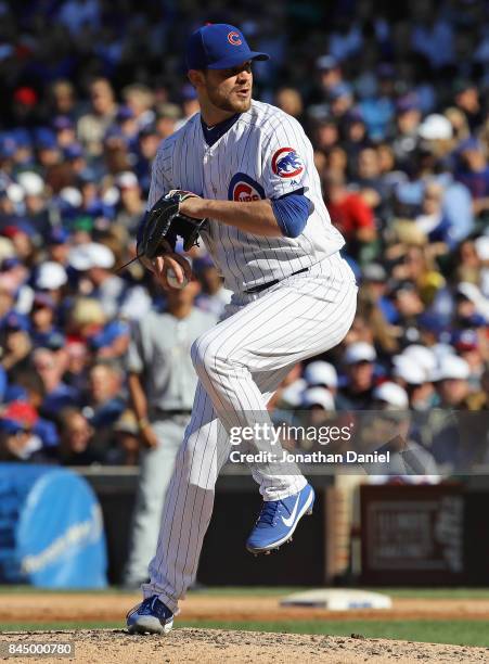 Justin Grimm of the Chicago Cubs pitches in the 3rd inning against the Milwaukee Brewers at Wrigley Field on September 9, 2017 in Chicago, Illinois.