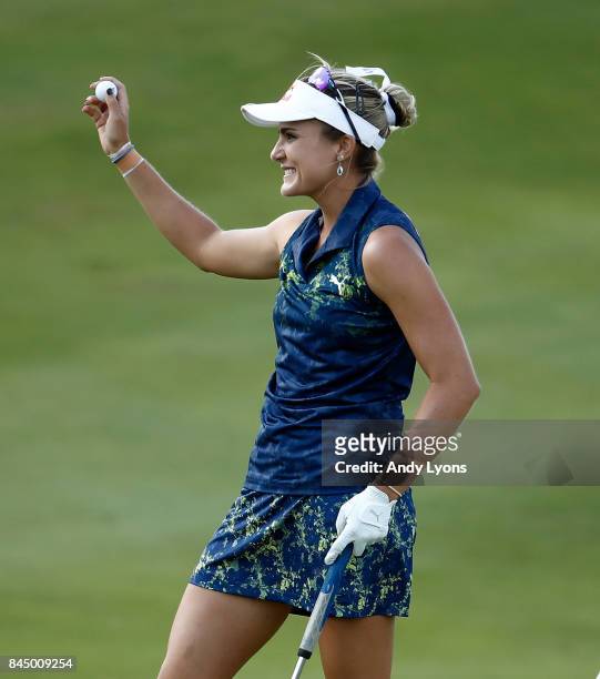 Lexi Thompson celebrates after winning the Indy Women In Tech Championship-Presented By Guggenheim at the Brickyard Crossing Golf Course on September...