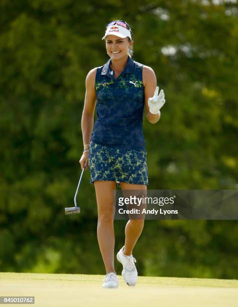 Lexi Thompson waves to the crowd on the 15th hole on the way to winning the Indy Women In Tech Championship-Presented By Guggenheim at the Brickyard...