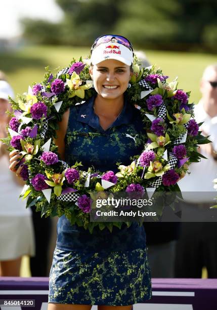 Lexi Thompson a winner's wreath after winning the Indy Women In Tech Championship-Presented By Guggenheim at the Brickyard Crossing Golf Course on...