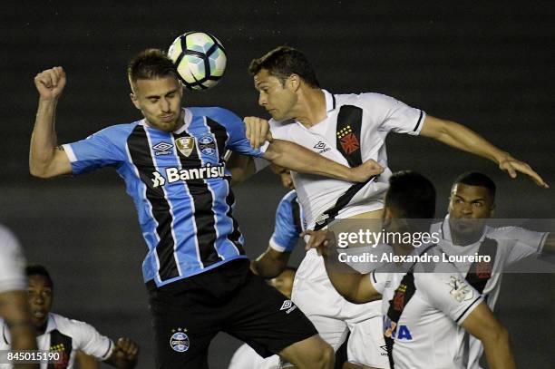 Anderson Martins of Vasco da Gama battles for the ball with Ramiro of Gremio during the match between Vasco da Gama and Gremio as part of Brasileirao...