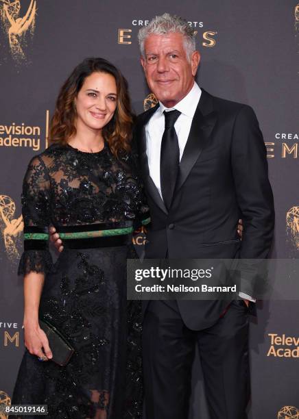 Actor Asia Argento and Anthony Bourdain attend day 1 of the 2017 Creative Arts Emmy Awards at Microsoft Theater on September 9, 2017 in Los Angeles,...